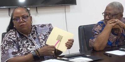 Amb.-Cllr.-Wesseh-holding-up-a-sample-of-the-diploma.jpg