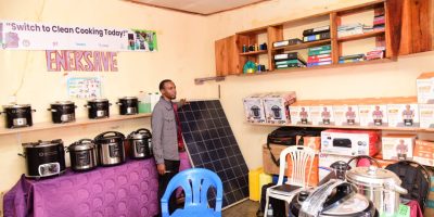 Emmanuel-Bassa-the-director-of-Enersave-Enterprises-Limited-showcasing-some-of-the-solar-technologie.jpeg