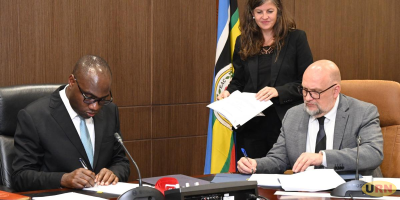 Finance-Minister-Henry-Musasizi-and-the-Charge-dAffaires-at-the-US-Embassy-Mikael-Cleverley-signing.png