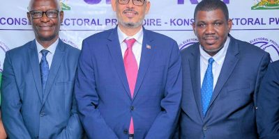 Jean-Gracien-Minister-Delegate-in-charge-of-electoral-matters-Alix-Didier-Fils-Aime-and-CEP-presiden.jpeg