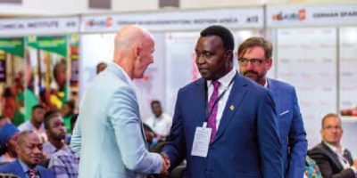 Mr-Krull-and-the-education-Minister-Dr-Osei-Yaw-Adutwum-at-the-fair.jpg