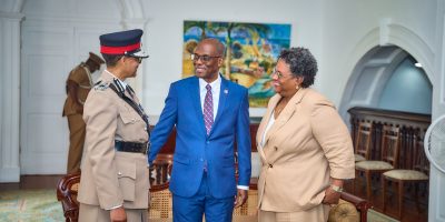 Newly-sworn-in-Commissioner-of-Police-Sonia-Boyce-sharing-a-light-moment-with-Acting-President-Jeffr.jpeg