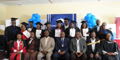 Officials-and-Graduates-pose-for-a-group-photo.jpg