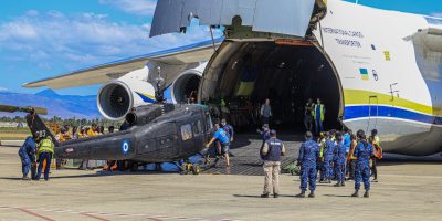 One-of-the-3-helicopters-outside-the-cargo-plane-that-transported-it.-Photo-by-Dieugo-Andre-for-Haitian-Times-1-scaled.jpg