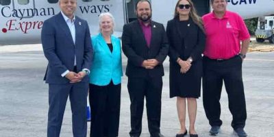 Photo-2-HE-Governor-Owen-and-Members-of-NCFC-Government-at-Little-Cayman-Airport-copy-1.jpg