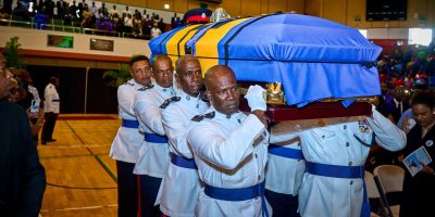 Police-Officers-carrying-the-casket-bearing-the-body-of-their-former-colleague-at-Tuesdays-service-scaled-e1740559157378.jpg