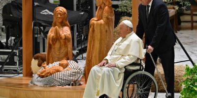 Pope-Francis-left-looks-at-the-Nativity-of-Bethlehem-2024-during-its-inauguration-on-St-Peters-Square-in-the-Paul-VI-Audience-Hall-at-the-Vatican-on-December-7-2024-Andreas-Solaro_AFP.jpg