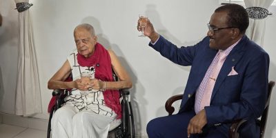 President-Jeffrey-Bostic-toasts-centenarian-Esther-Lilian-Wickham-scaled.jpg