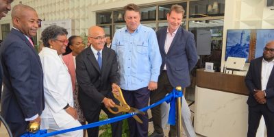 Prime-Ministers-Special-Envoy-William-Duiguid-cuts-the-ribbon-to-officially-open-Barbados-newest-lux.jpeg