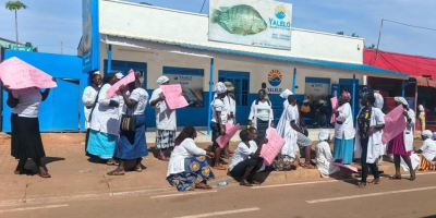 Some-of-the-Fish-Vendors-hold-placards-in-protest-at-Yalelo-Gulu-City-Store-in-Gulu-City-on-Septembe.png