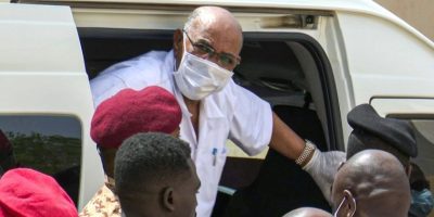 Sudans-ousted-president-Omar-al-Bashir-gets-out-of-a-car-to-attend-his-trial-at-a-Khartoum-court-in-this-AFPTV-image-AFP-Photo-Mohammed-ABUAMRAIN.jpg