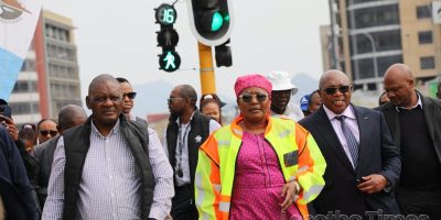 Teboho-Mokhoane-left-Tsepang-Koele-and-Matjato-Moteane-lead-the-inclusive-traffic-lights-launch.jpg