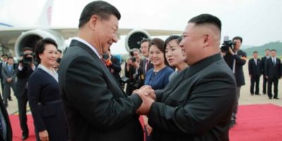 kim-jong-un-xi-jinping-pyongyang-airport-june-2019.jpg