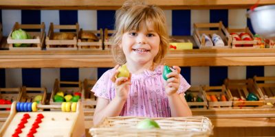 little-preschool-girl-play-food-939822779_246b9e.jpg