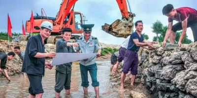 north-korea-river-embankment-repair-workers-rodong-sinmun-2023.jpg