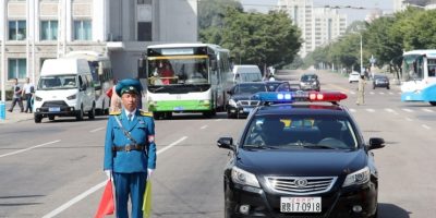north-korean-traffic-police-officer-directs-traffic-pyongyang-streets.jpg