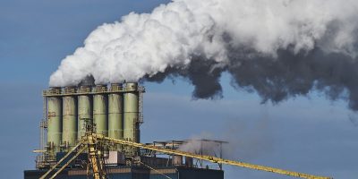 smoke-coming-out-factories-industrial-area-e1735977374404.jpg